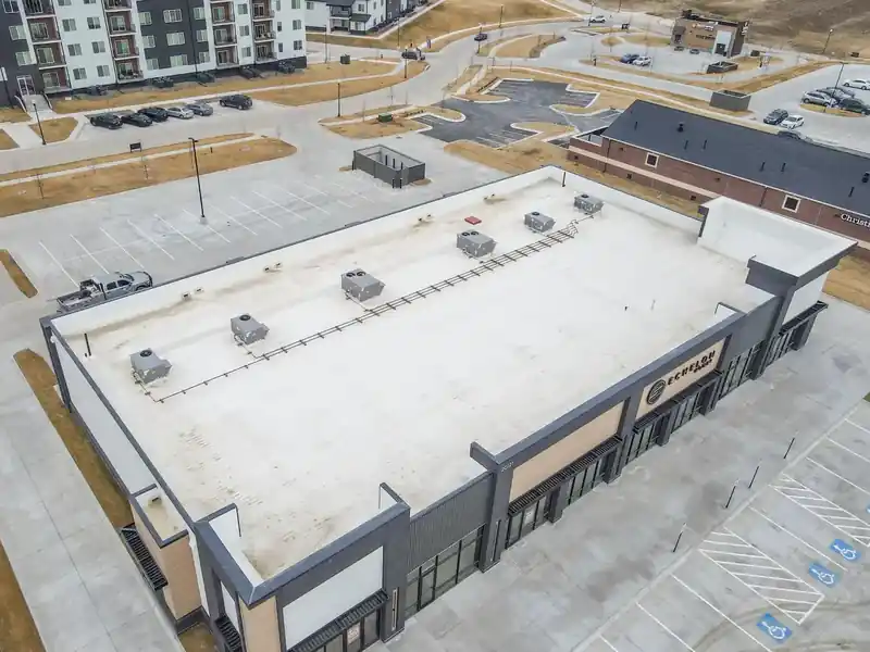 Apartment development with Elevate single-ply flat roofs in the Omaha metro by Royalty Roofing