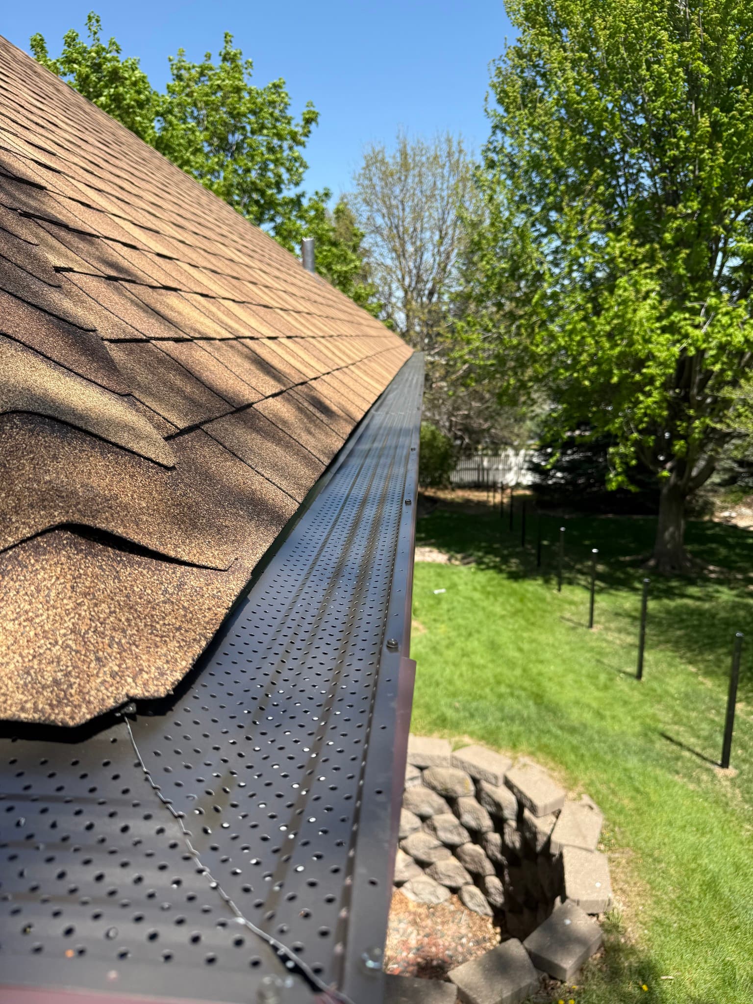 Omaha neighborhood with new seamless gutters installed by Royalty Roofing and Siding