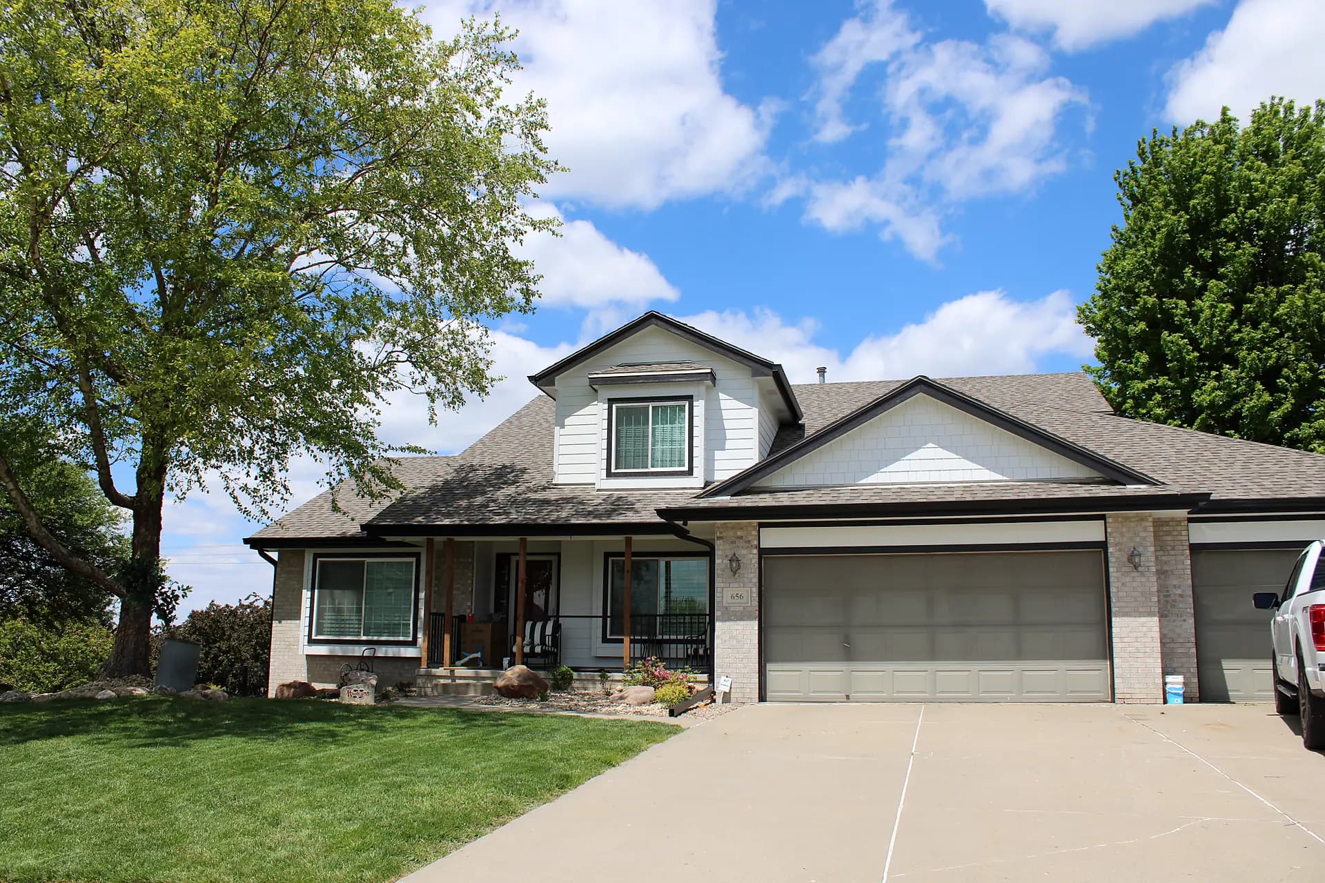Royalty Roofing and Siding — craftsman home with new roof in Omaha, NE