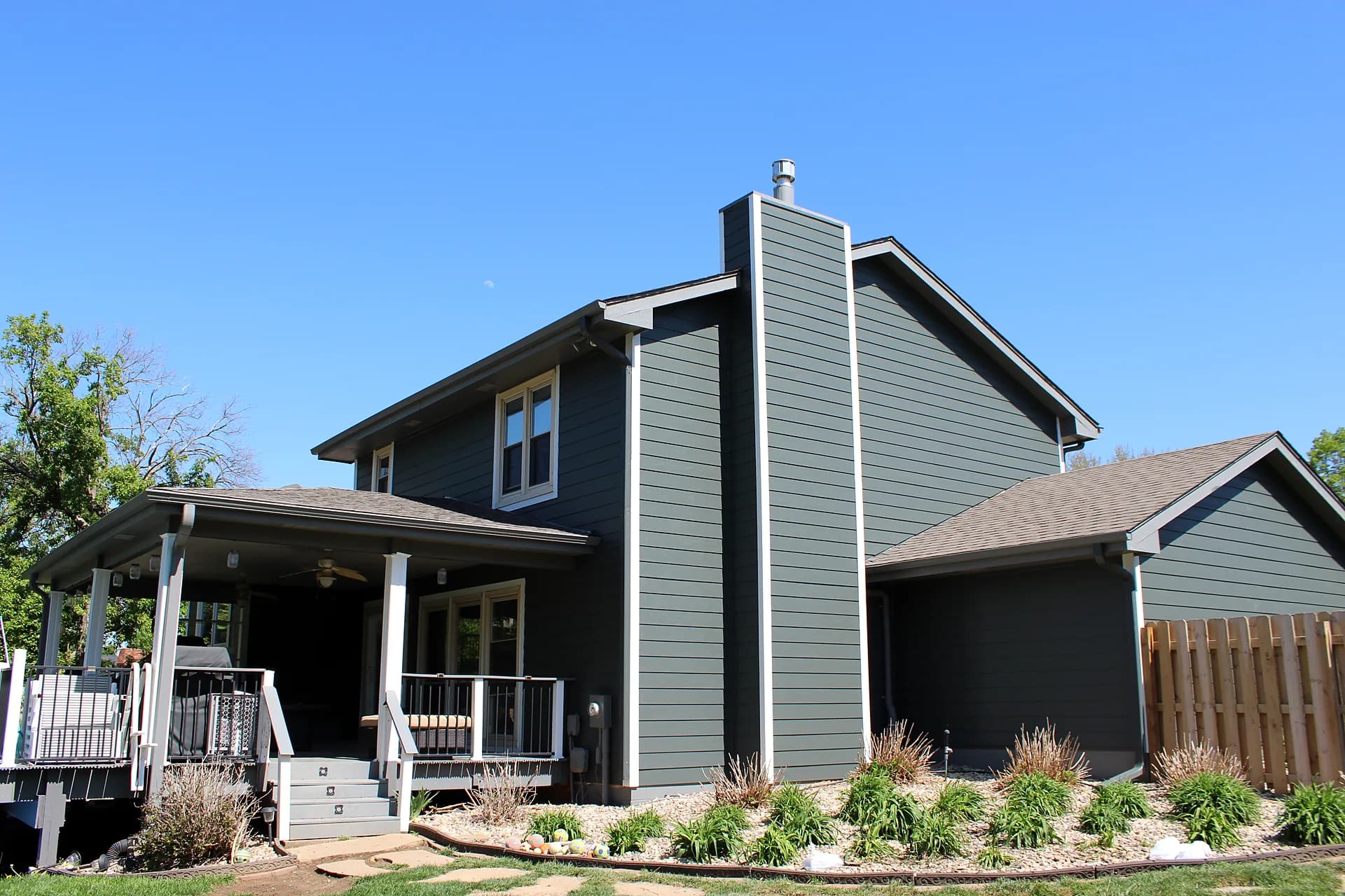 Home exterior with new siding installed by Royalty Roofing in Omaha