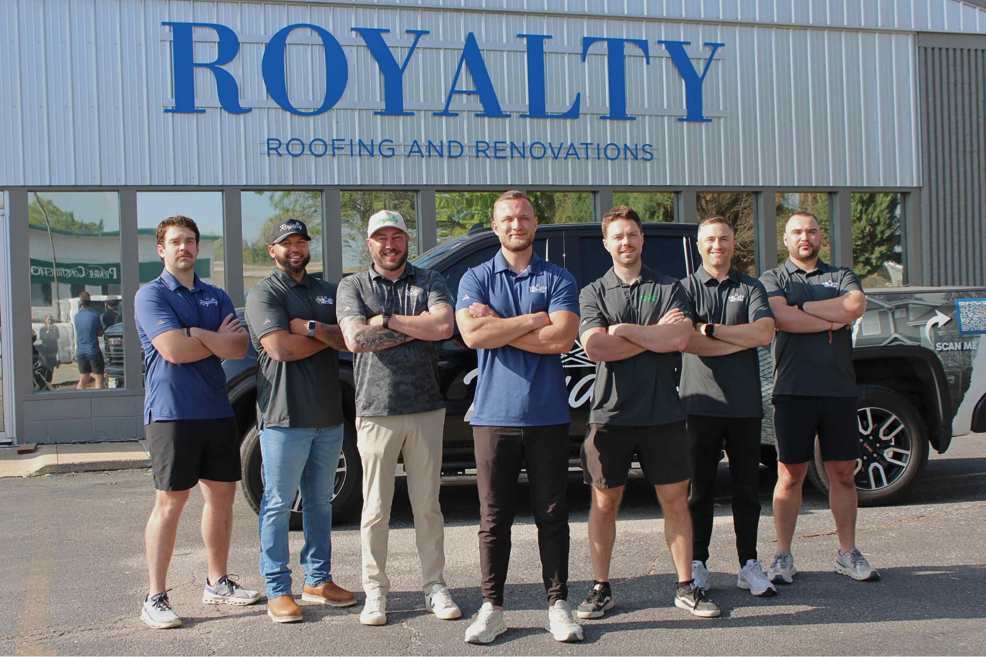 Royalty Roofing residential project managers standing together outside the Omaha office