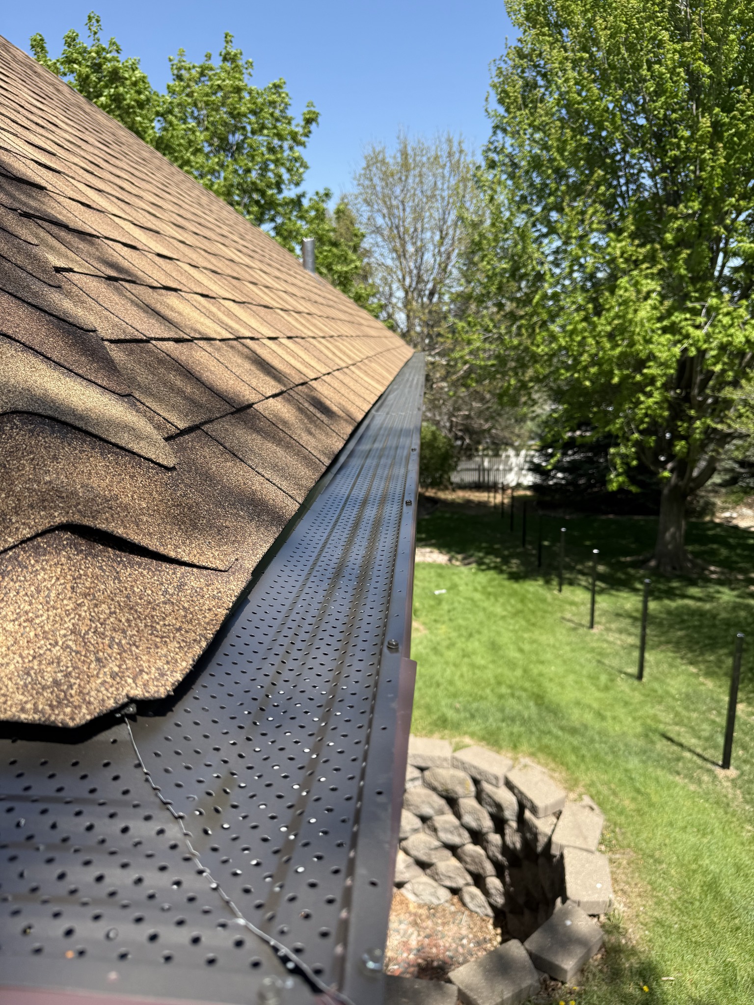 Omaha neighborhood with new seamless gutters installed by Royalty Roofing and Siding