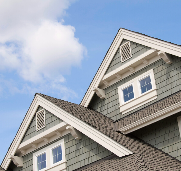 Roofing Maintenance Tips for Every Season Partly cloudy weather over home's roof